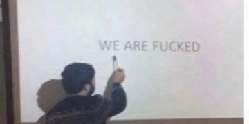 Person pointing at screen projecting anxiety about the future.