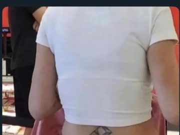 A back tattoo creating an optical illusion of a surprising number.