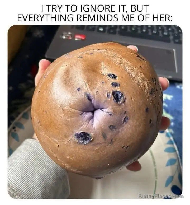 Blueberry bagel humorously resembles a personal feature.
