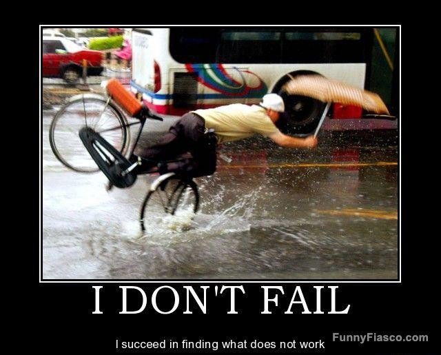 Man hilariously falling off a bike in the rain with an umbrella.