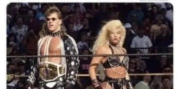 Two wrestlers dressed boldly, embodying Harley Davidson confidence.