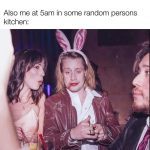 Person with bunny ears, makeup smeared, at a party looks tired.