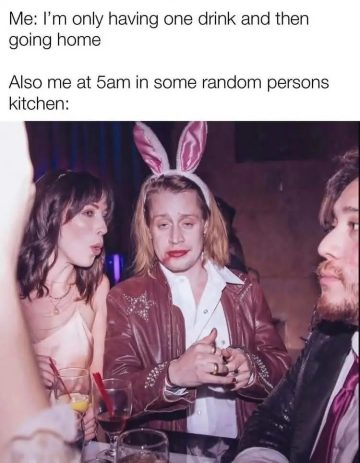 Person with bunny ears, makeup smeared, at a party looks tired.
