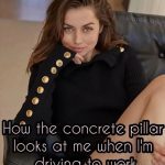 Woman in black sweater with text about concrete pillar staring.