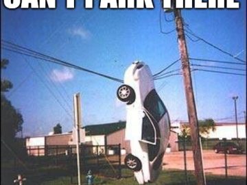 Car hanging on wires with "Hey You Can't Park There" text overlay.