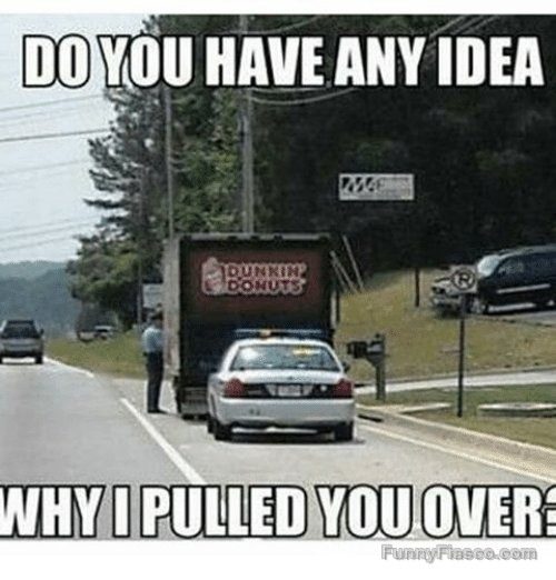 Police car behind Dunkin Donuts truck with a traffic stop joke.