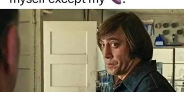 Man smirking after rubbing garlic everywhere but one spot.