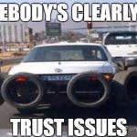 Car with tires chained to it for extra security, funny meme