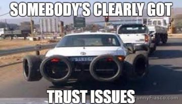 Car with tires chained to it for extra security, funny meme