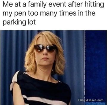 Woman in sunglasses at family event looking unimpressed.