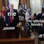 Person in office ignoring a pile of unfolded laundry labeled "me" and "my unfolded laundry."