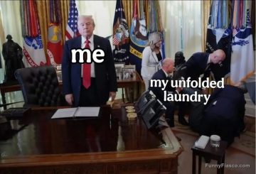 Person in office ignoring a pile of unfolded laundry labeled "me" and "my unfolded laundry."