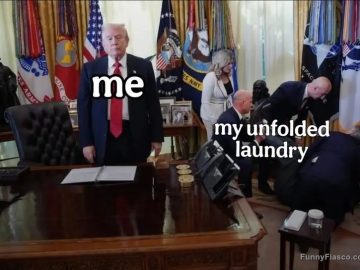 Person in office ignoring a pile of unfolded laundry labeled "me" and "my unfolded laundry."