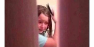 Crying child brushing hair with "Let's get this paycheck" text