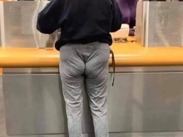 Person in tight pants at bank, relatable tight budget humor.