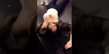 Shirtless man at the top of a staircase moments before a homemade stunt goes wrong.