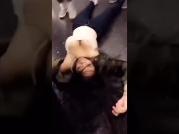 Shirtless man at the top of a staircase moments before a homemade stunt goes wrong.