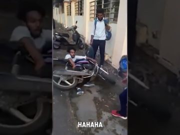 A man slips on an icy driveway while carrying an American flag during a funny fails compilation.