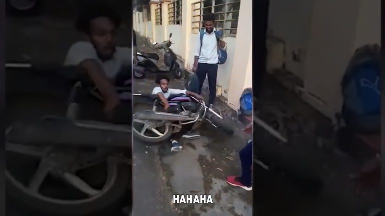 A man slips on an icy driveway while carrying an American flag during a funny fails compilation.