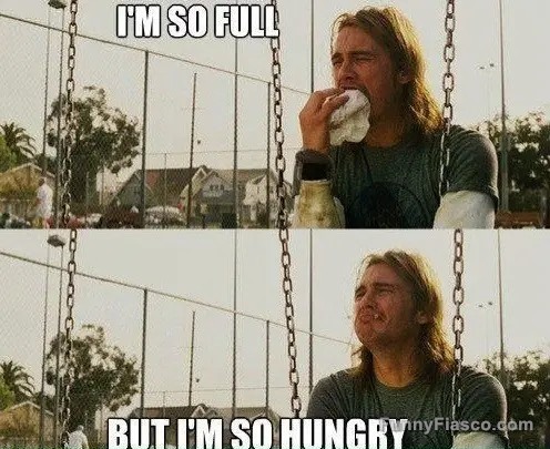 A man eating while saying "I'm so full, but I'm so hungry."