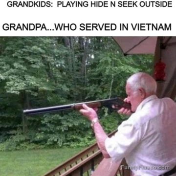 Grandpa veteran holding a rifle during a hide and seek game.