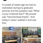 Classroom of students dressed in hammerhead shark costumes, surprising teacher.