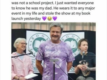 Dad wearing a purple tie-dye shirt that says "Hannah's Dad" at a book launch.