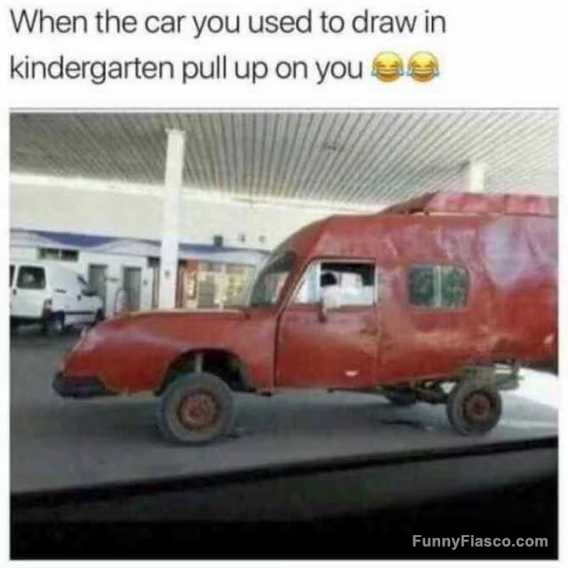 Wacky red car resembling a child’s drawing at a gas station.
