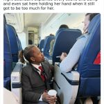 Flight attendant kneeling and comforting a nervous passenger.