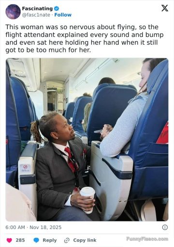 Flight attendant kneeling and comforting a nervous passenger.
