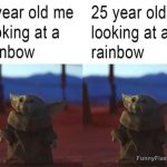 Young and adult both enjoying a rainbow with equal delight