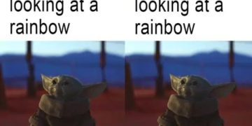 Young and adult both enjoying a rainbow with equal delight