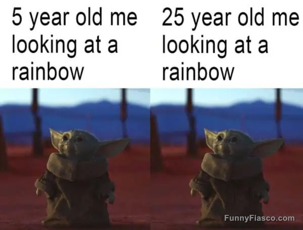 Young and adult both enjoying a rainbow with equal delight
