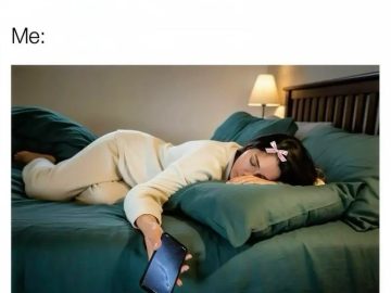 Person asleep holding phone, ignoring messages online.
