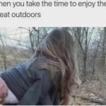 Woman enjoying a humorous moment in the woods.