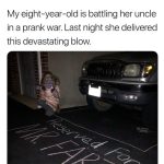 Child's prank with chalk: "Reserved for Mr. Fart" on driveway