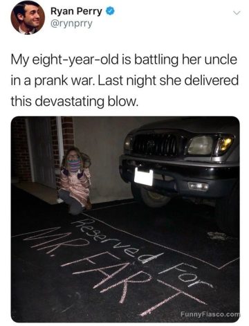 Child's prank with chalk: "Reserved for Mr. Fart" on driveway