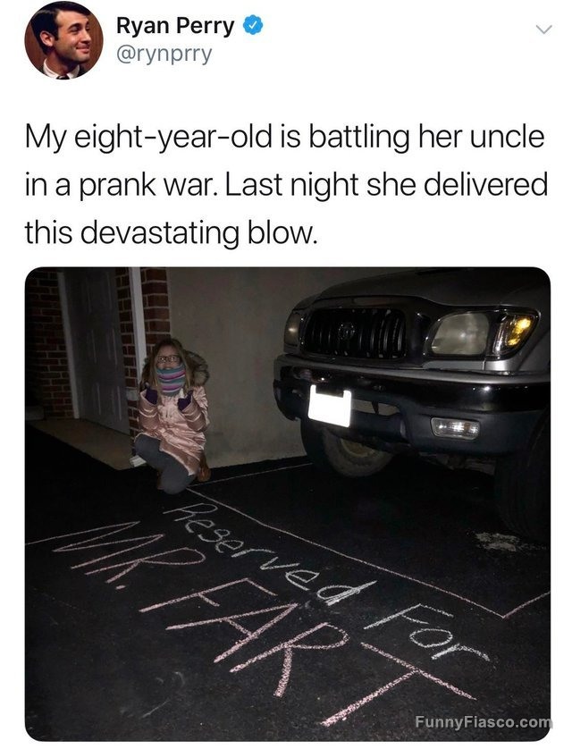Child's prank with chalk: "Reserved for Mr. Fart" on driveway