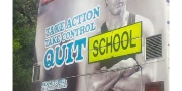 Bus advertisement mistakenly says "Quit School" over "Quit Smoking."