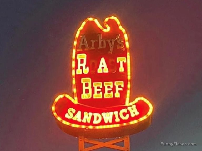 Neon sign mishap shows "Rat Beef Sandwich" instead of roast beef.