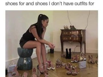 Woman surrounded by shoes, pondering outfit and shoe mismatches.