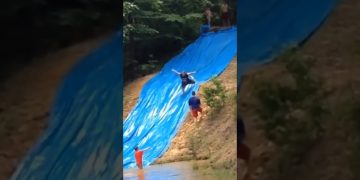 A cyclist splashes into shallow water during an unexpected fail compilation.