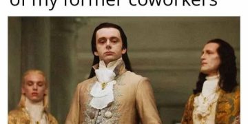 Person dressed in regal attire watching coworkers, last day at work